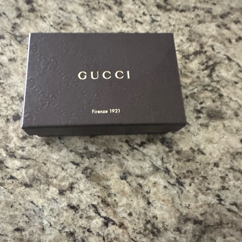 Gucci Embossed Box and pouch